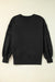 Black sweatshirt with exposed seams, dropped shoulders, round neck, slits