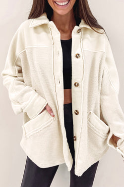 Beige buttoned jacket with pocket and raw hem