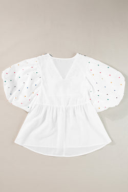 White blouse embroidered with puffy sleeves and v -collar