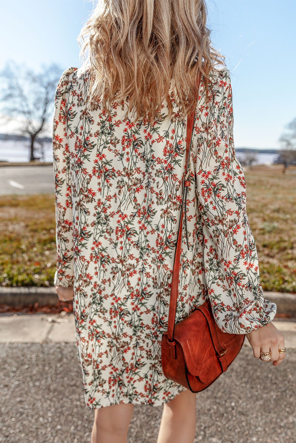 White long sleeve mini dress with floral print