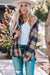 Black oversized plaid jacket with rounded hem and slits