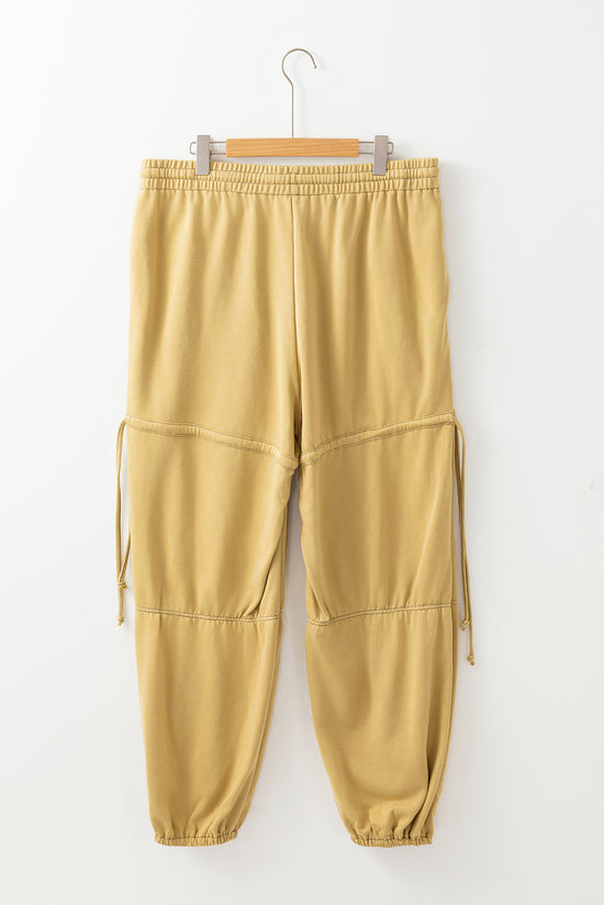 Beige high waisted drawstring fitted band pants