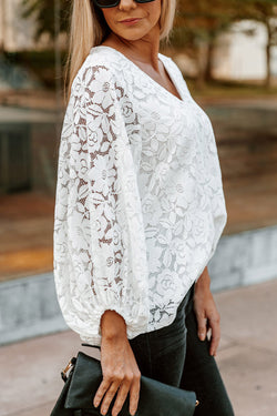 Ample white high with V -neck and crochet floral lace