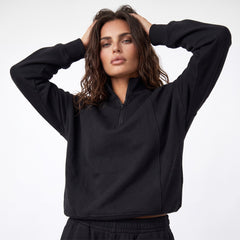 Black zip-up sweatshirt with dropped shoulders