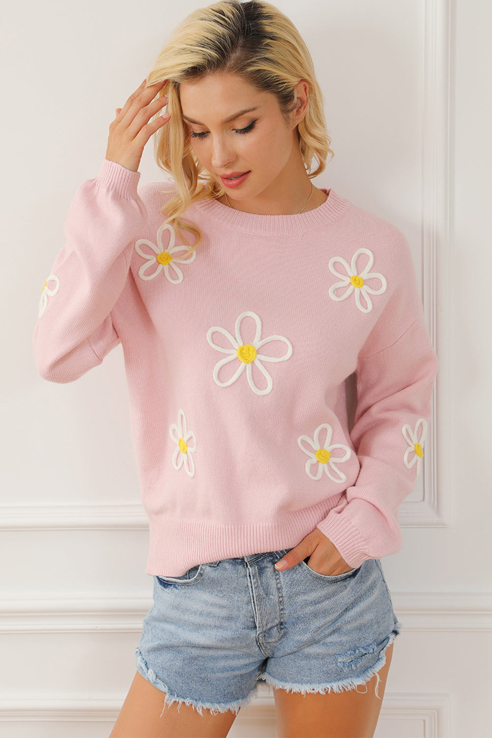 Pink chenille crew neck sweater with daisy stitching