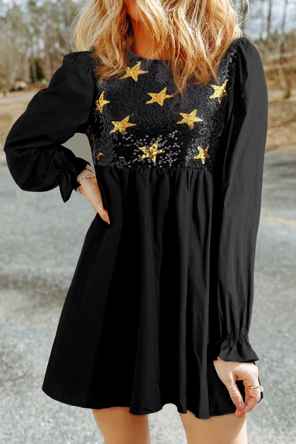 Black babydoll dress with ruffles and glitter stars with fluffy sleeves