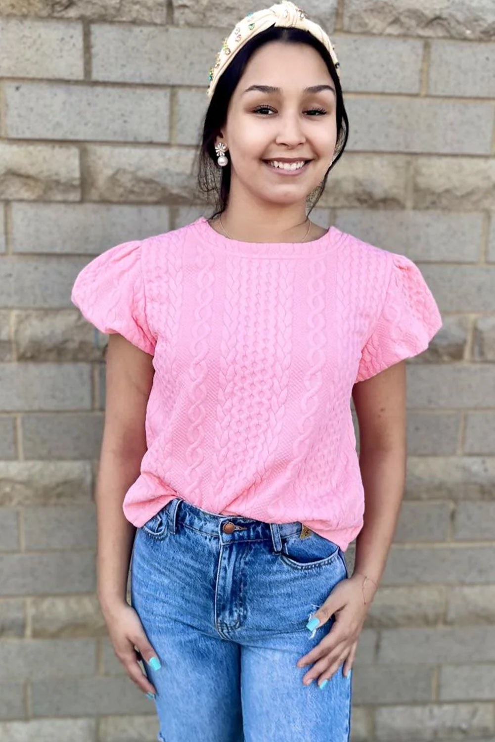 Camiseta rosa texturizada con mangas hinchadas