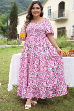 Vestido rosa con mangas hinchadas y estampado floral grande