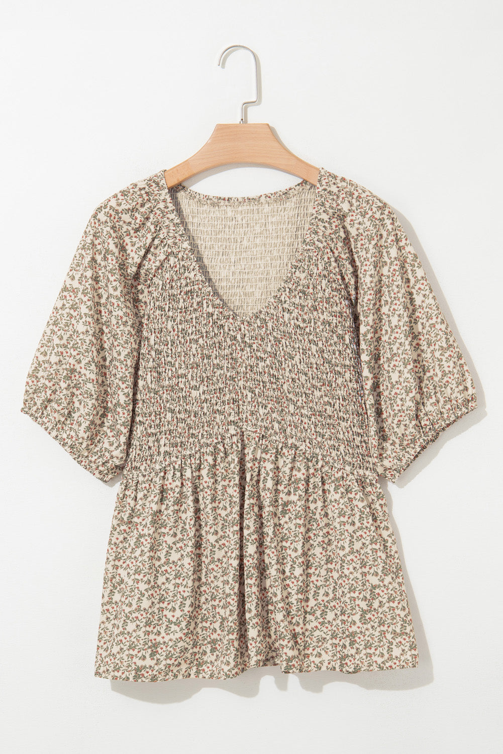 Smocked top with puffy sleeves and floral print