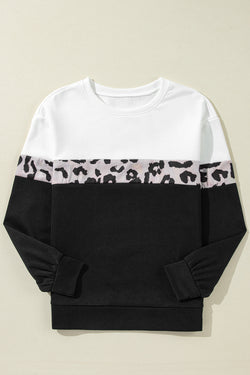 Black leopard top with long sleeves and a color block crew neck