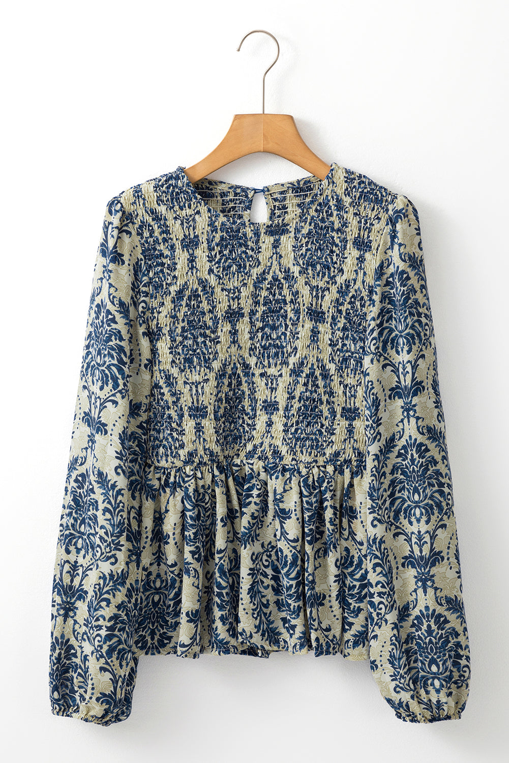 Chemisier péplum smocké à manches ballon *-A WOMAN WE LOVE