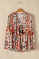 Chemisier orange à imprimé floral et col en V *-A WOMAN WE LOVE