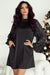 Black mini dress with shimmering mesh sleeves and high neck