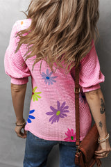 Camiseta con estampados florales rosa hinchado