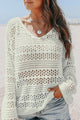 White V -neck sweater and openwork hook