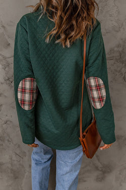 Green sweatshirt with geometric texture and plaid border