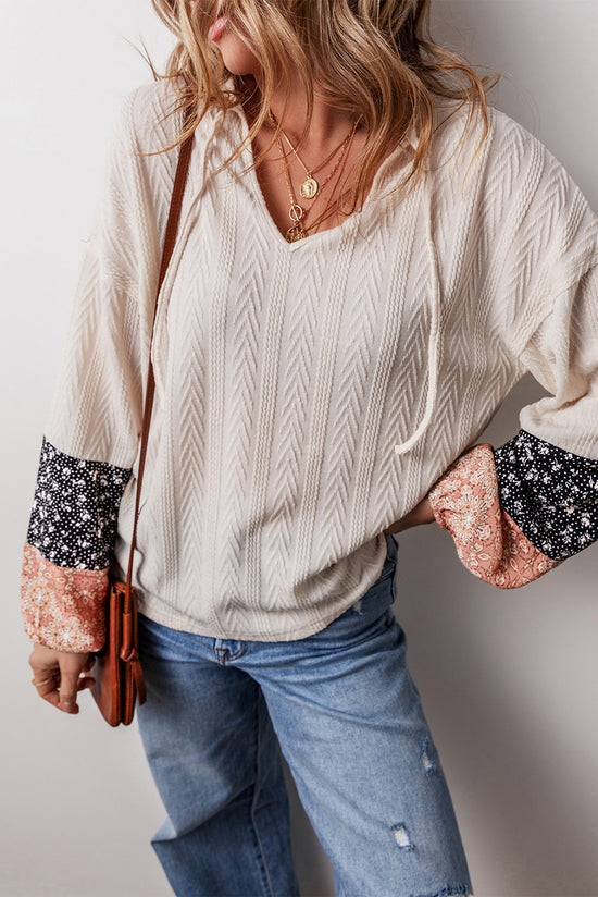 Blusa beige con cordón apretado *