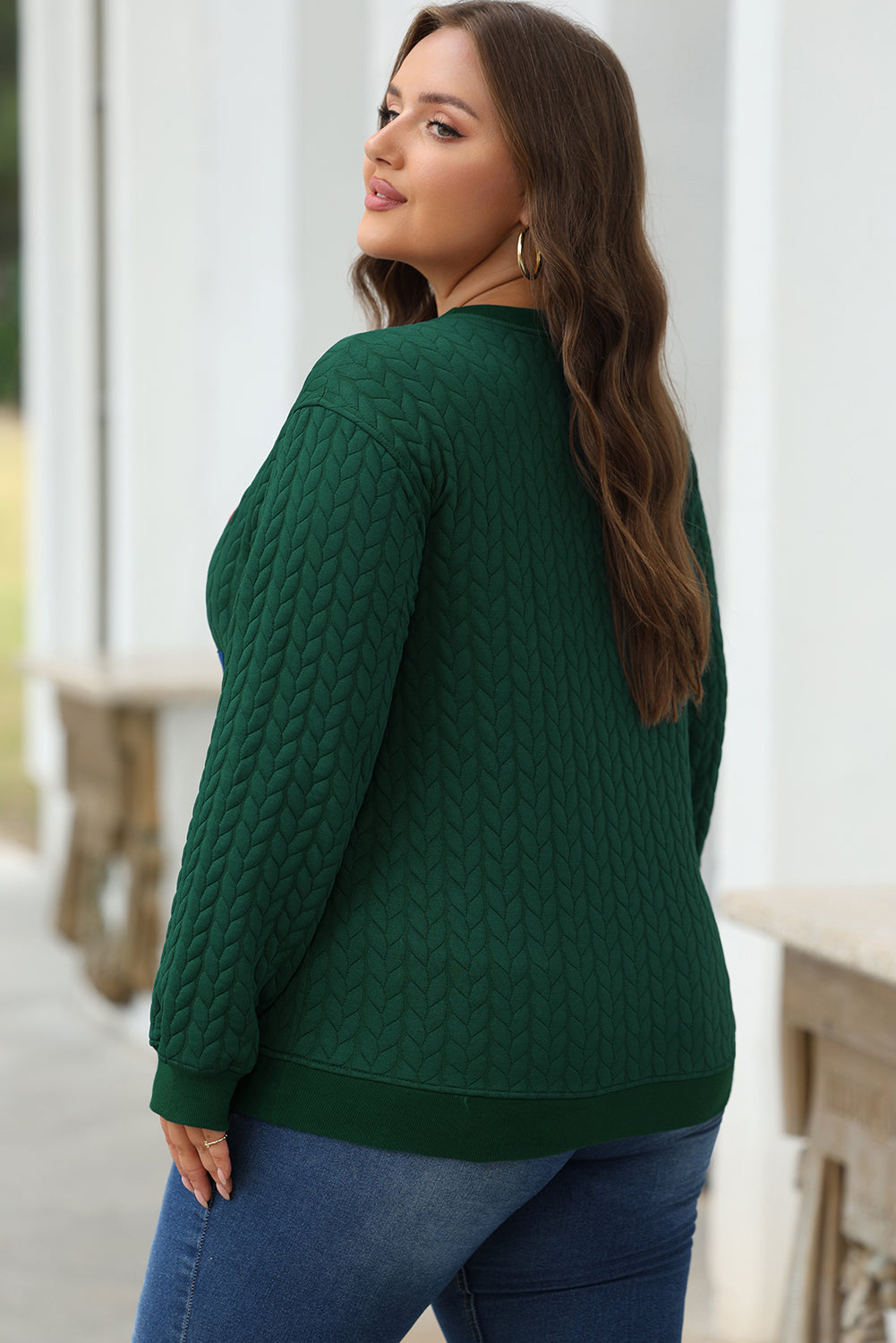 Sudadera de tejer retorcido azul y luminoso de tejer torcido