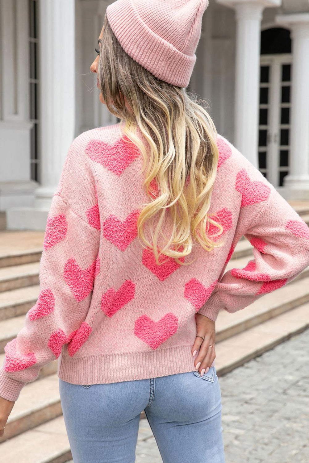 Pull en tricot de coeur de la Saint-Valentin rose clair