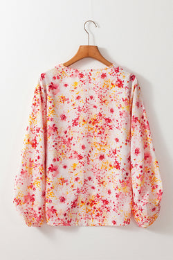 Blusa rosa con pequeñas flores *