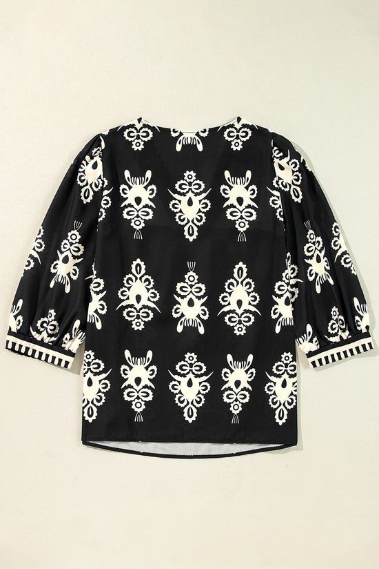 Blusa negra con impresión geométrica vintage *