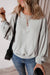 Grey sweatshirt with exposed seams, batwing sleeves and dropped shoulders