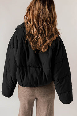 Black zipped down jackets with drawstring hem