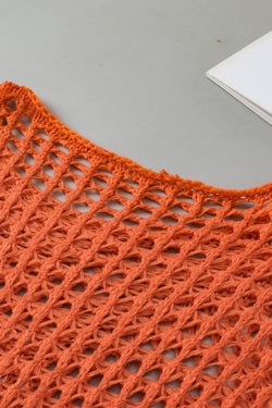 Orange tunic with handle knitting sleeves open to crochet