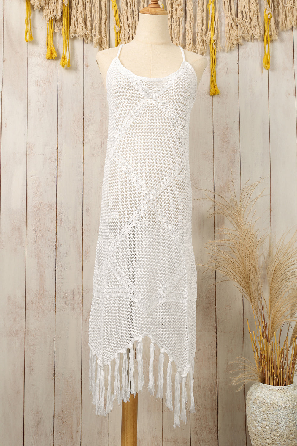 Robe de plage blanche à pompons et nœud croisé dans le dos