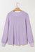 Ample blouse with embossed orchid petals, V -neck, long sleeves, falling shoulders