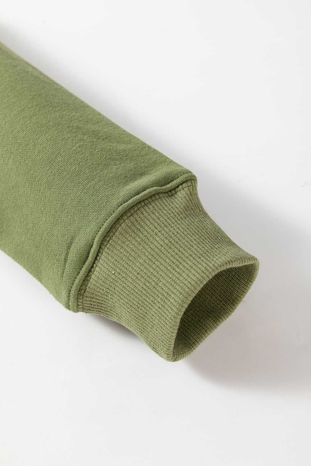 Ample sweatshirt with pockets and crossed seams *
