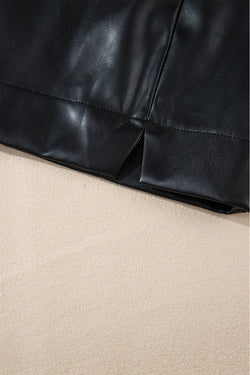 Mini-skirt high size slim cut in black leather with side slits