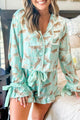 Short pajamas with ruffles in green leopard satin