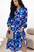 Robe mi-longue bleue à fleurs et manches paysannes à volants et volants