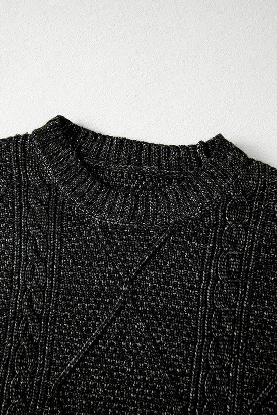 Large black sweater dress in twisted knitted with drooping shoulders