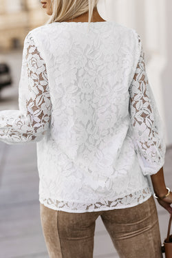 Ample white high with V -neck and crochet floral lace