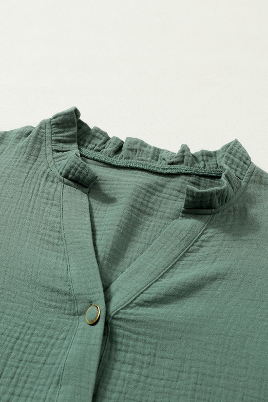 Green crumpled shirt with split collar and ruffles