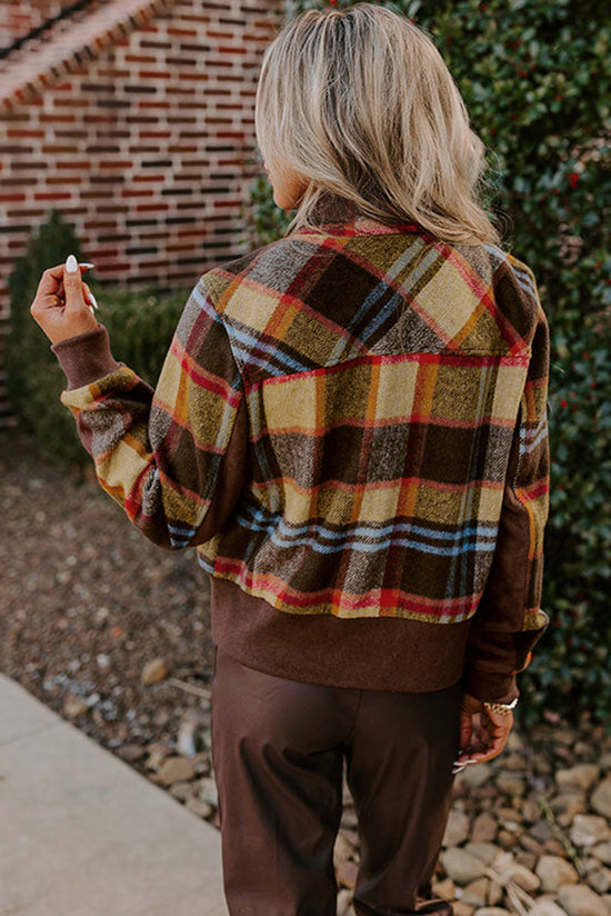 Brown jacket with printed tiles with chest pockets and buttons zipper and upright collar