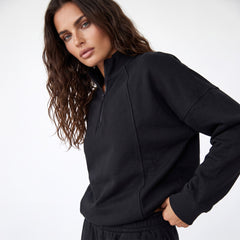 Black zip-up sweatshirt with dropped shoulders