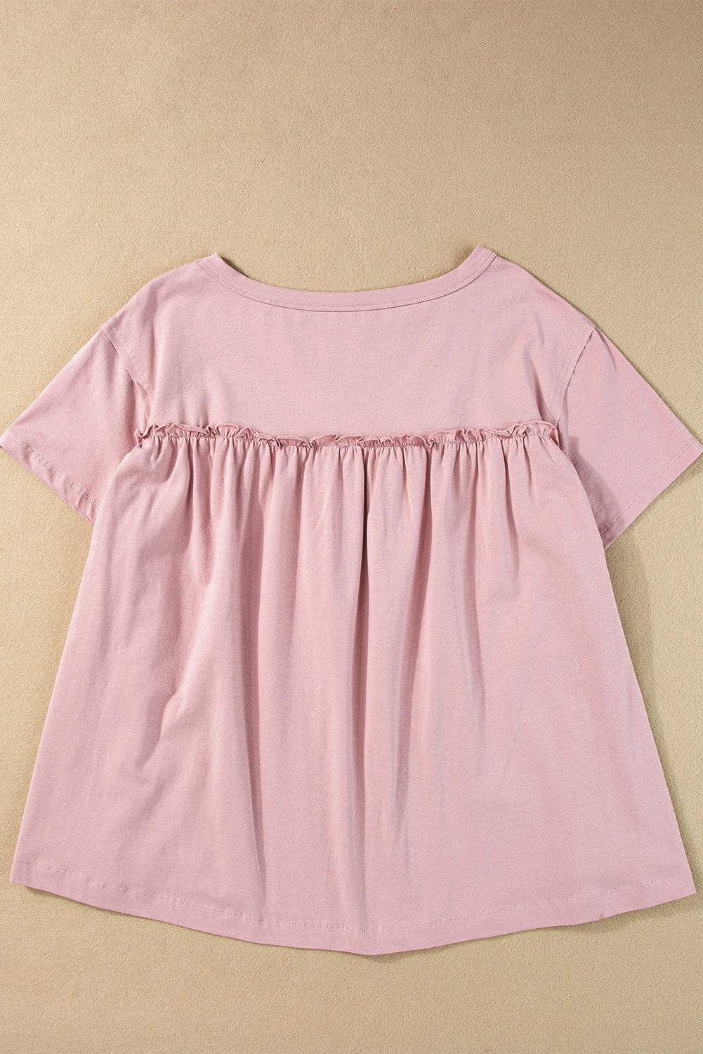 T-shirt babydoll ample rose clair à volants