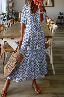 Long relaxed dress with geometric sky blue print with v -neck collar