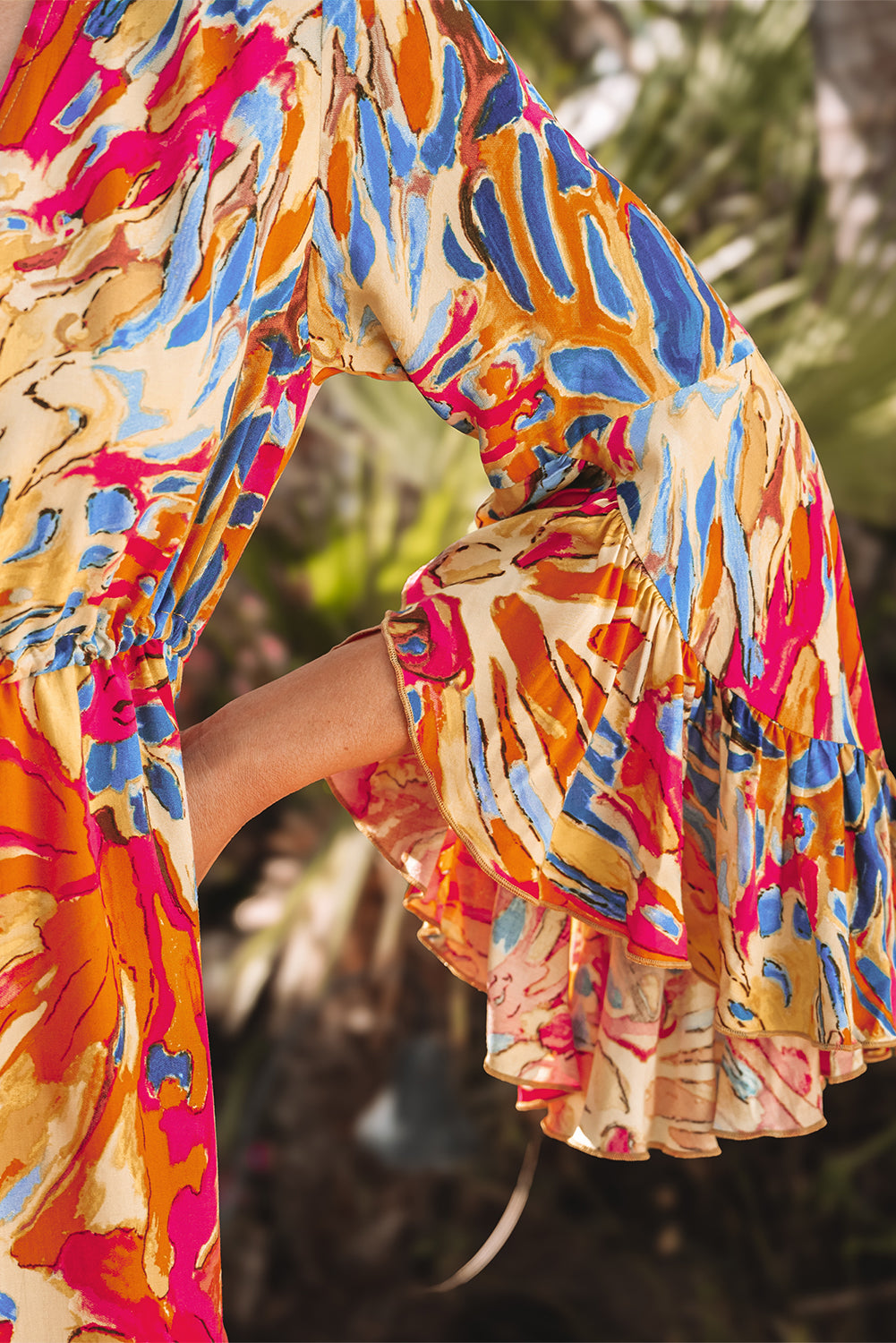 Robe fluide rose à manches évasées *