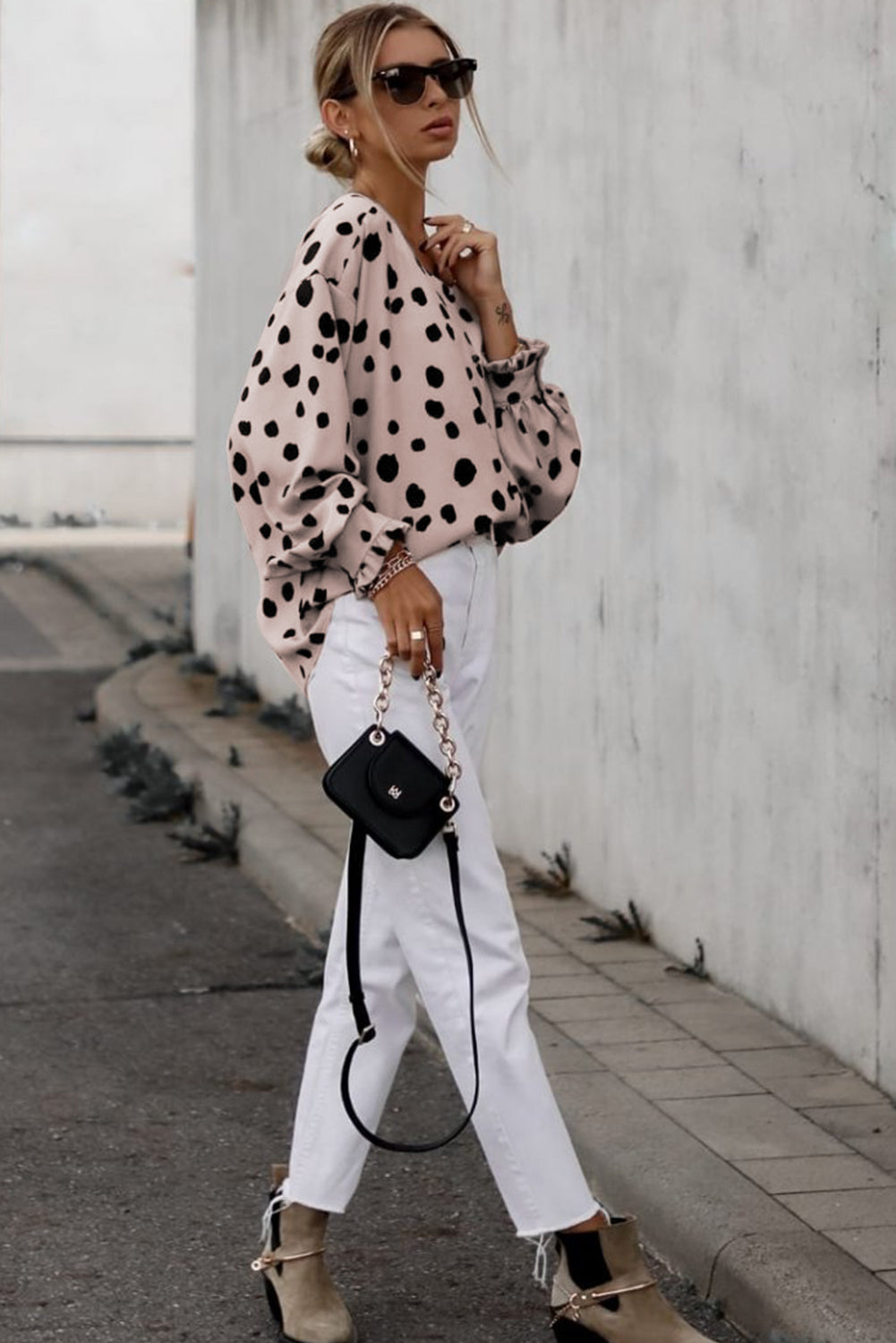 Blouse rose surdimensionnée à manches bouffantes et poignets à volants