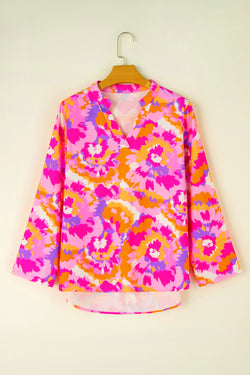 Pink blouse with abstract print and paw sleeves and notched neck