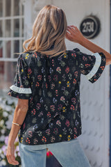 Chemise à fleurs à manches courtes et bordure