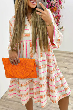 Loose dress with ruffles and bracelet sleeves in orange bohemian print, split collar