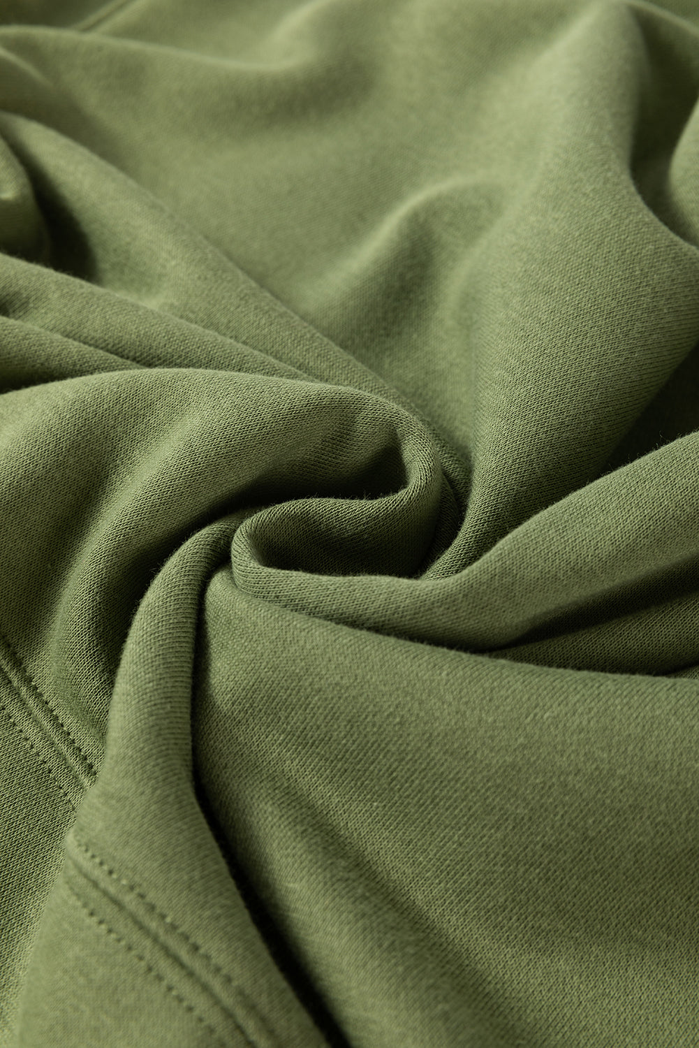 Ample sweatshirt with pockets and crossed seams *