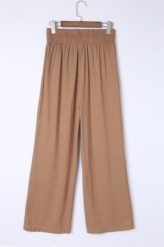 Large casual pants with elastic waist with brown tightening cord