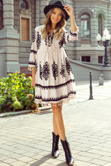Beige Mini-Warse con pompones con cuello en V y impresos con patrón occidental