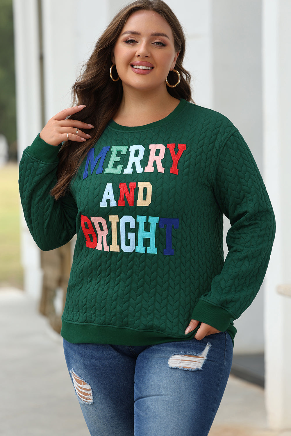 Sudadera de tejer retorcido azul y luminoso de tejer torcido